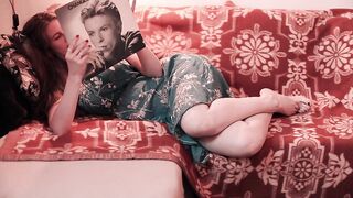 short-haired blonde stimulates redhead's