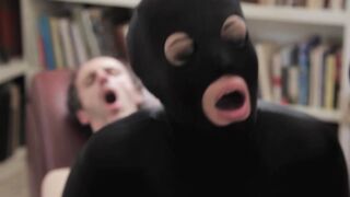 masked catwoman jumps and