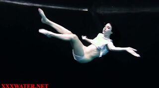 petite brunette teen swimming