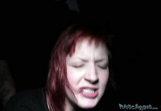 sassy redhead student paying