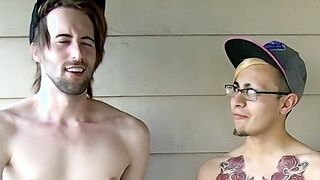 two tattooed twinks stroking